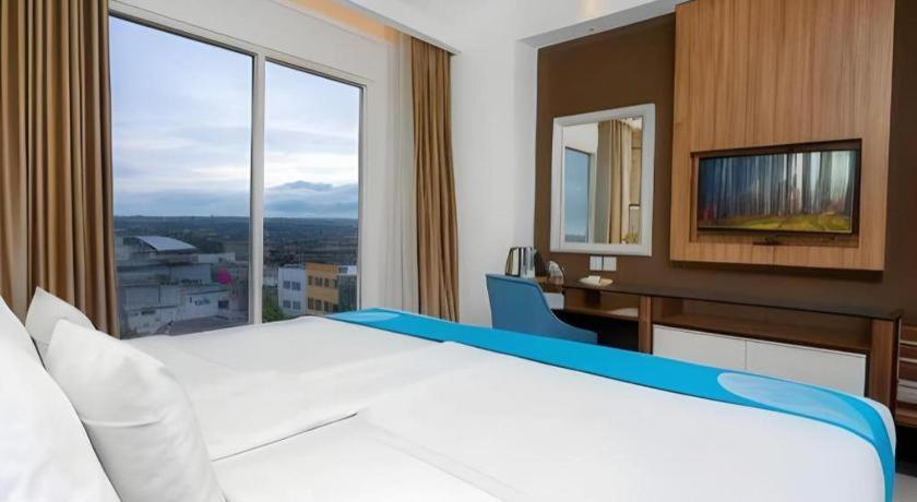 Java Lotus Hotel Джембер Экстерьер фото