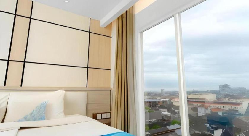 Java Lotus Hotel Джембер Экстерьер фото