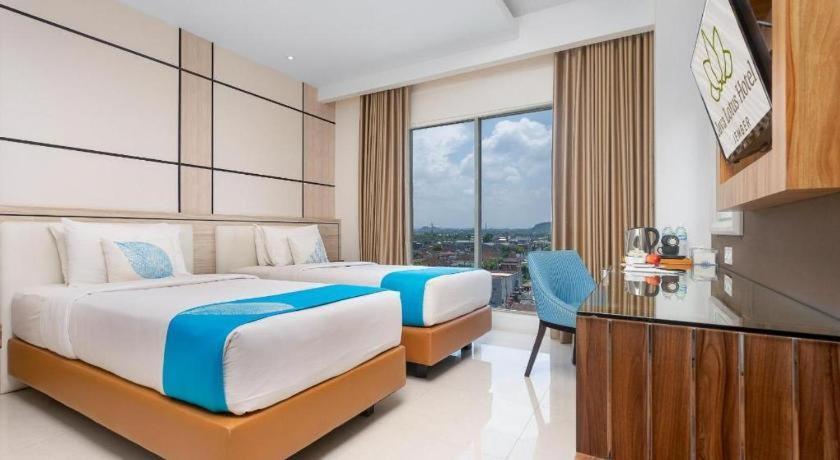 Java Lotus Hotel Джембер Экстерьер фото