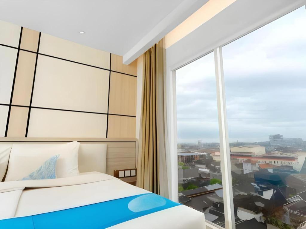 Java Lotus Hotel Джембер Экстерьер фото