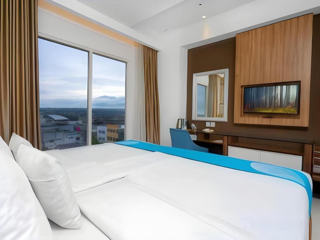 Java Lotus Hotel Джембер Экстерьер фото