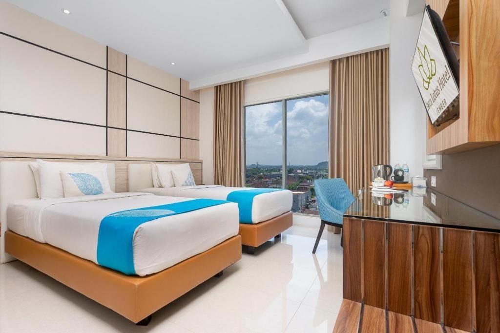 Java Lotus Hotel Джембер Экстерьер фото
