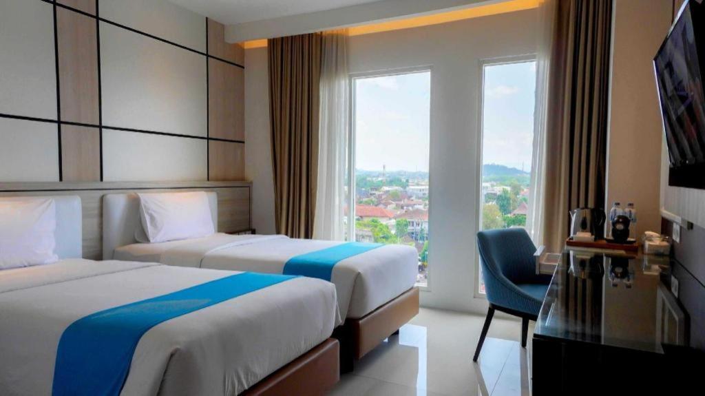 Java Lotus Hotel Джембер Экстерьер фото